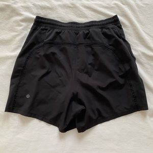 Men’s black Lululemon Pace Breaker Lined 5” short.